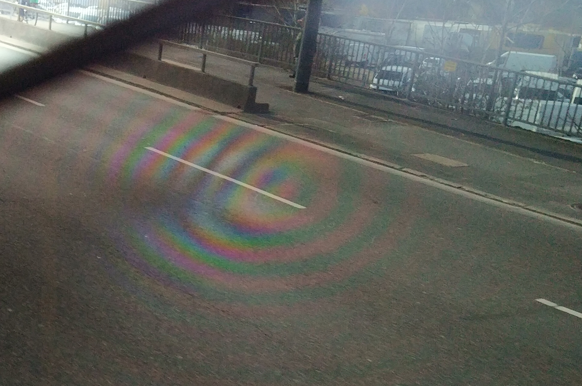 (Left) Photo captured through the window of a train using a common handheld device and viewed through the polarising lens of a pair of sunglasses.